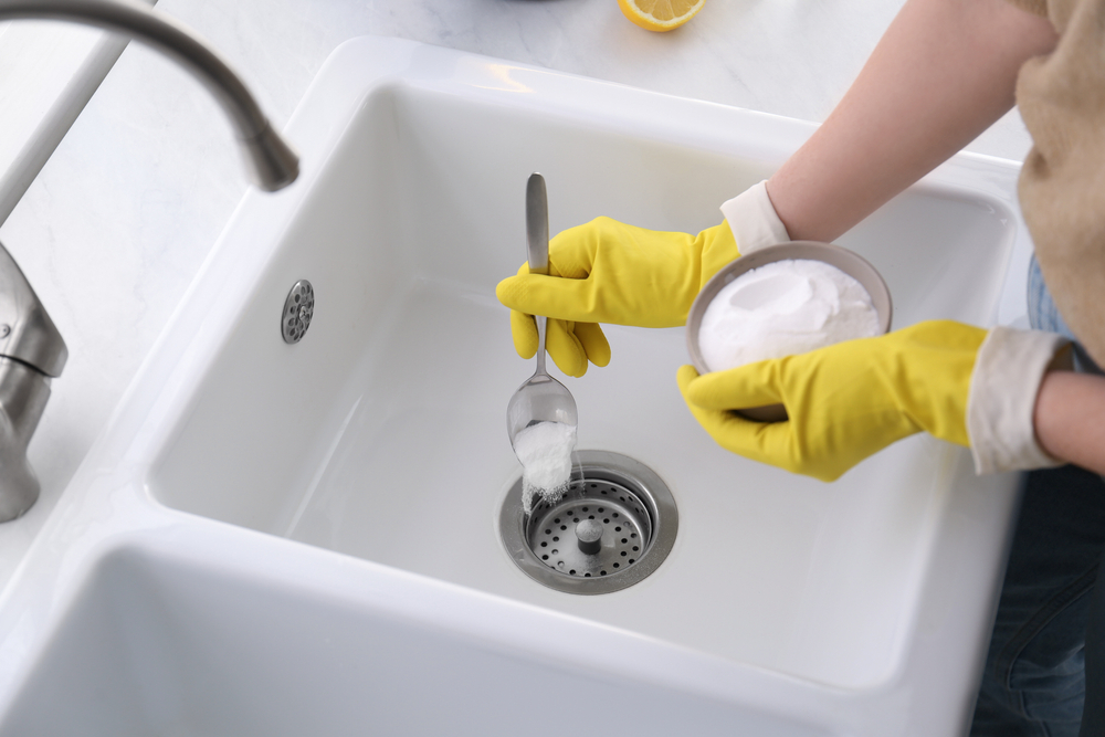 baking soda and vinegar dissolve grease and other particles from the pipes
